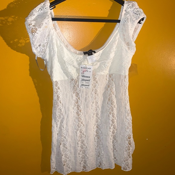 Never before worn tags on BEBE BABY DOLL TOP !! - Picture 2 of 3